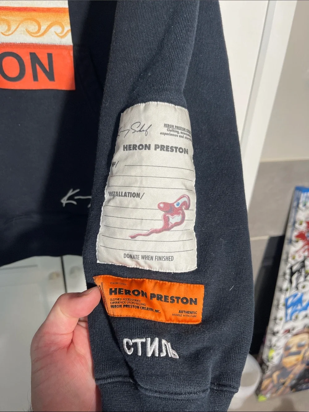 Heron Preston Black Hoodie with Orange Gradient Heron Graphic